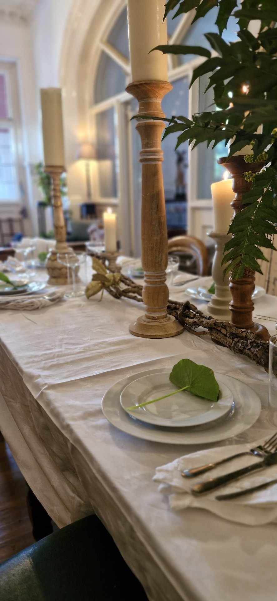 Candlelit table set for ceremony